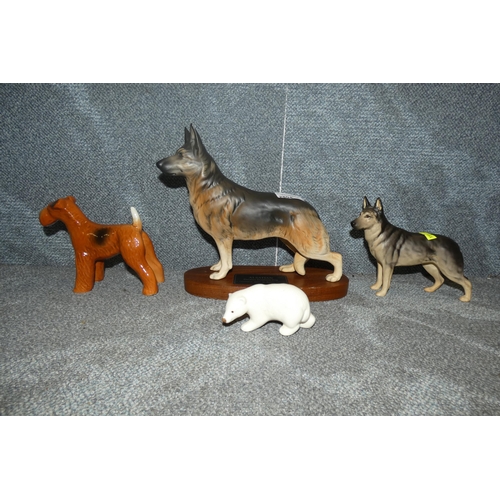 2804 - A Beswick Alsatian, a Melba ware terrier, a Szeiler polar bear and a small Beswick Alsatian