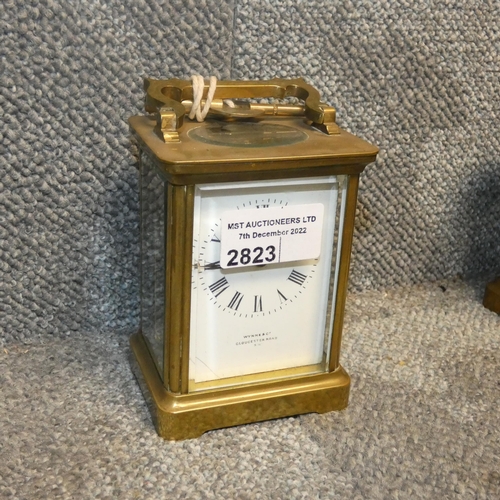 2823 - A small brass cased carriage clock