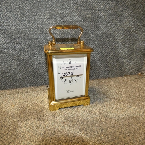 2835 - A small brass cased carriage clock