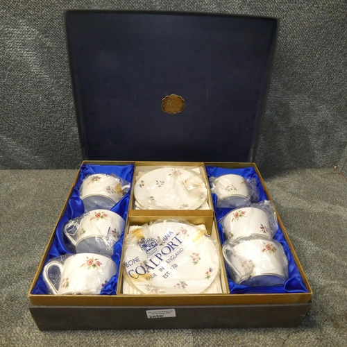 2850 - A boxed set of six floral decorated Coalport tea cups and saucers