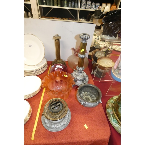 2853 - A decorative tall brass oil lamp with a ruby glass reservoir and various other oil lamp parts