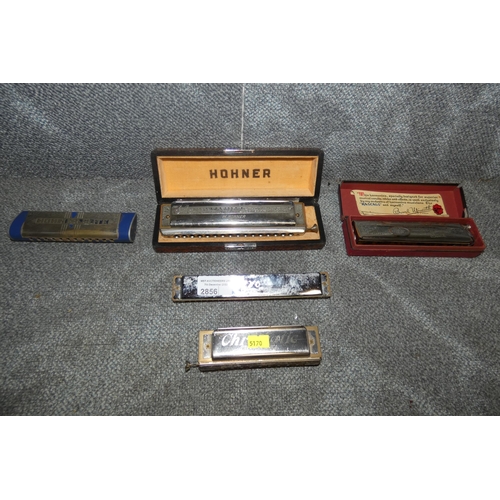 2856 - Five vintage harmonicas