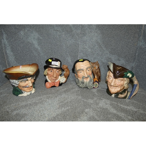 2859 - Four Royal Doulton character jugs, Merlin, Madhatter, Robin Hood and Dick Turpin