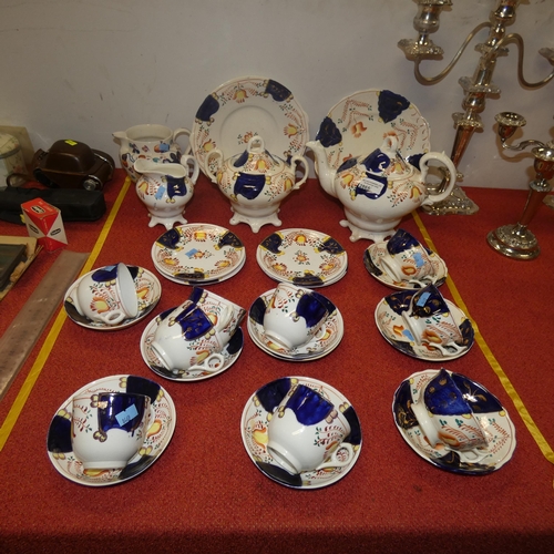 2865 - A blue, red and white floral patterned vintage teaset