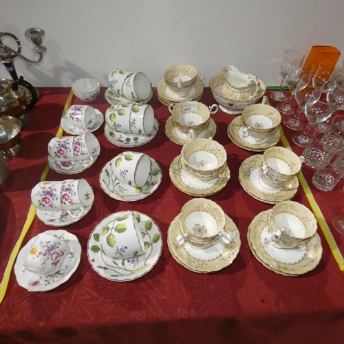 2897 - A set of 6 Royal Crown Derby coffee cups and saucers, a set of six leaf patterned tea cups and sauce... 