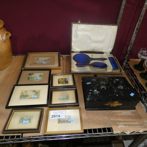 2914 - A vintage dressing table set, a mother of pearl inlaid ebonised writing box and a set of small frame... 