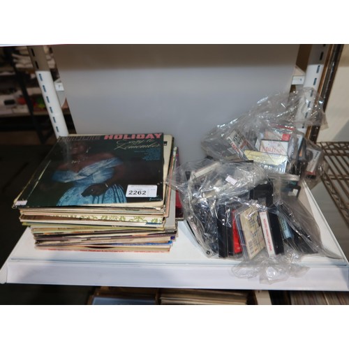 2262 - A quantity of various vinyl records and 2 bags of tapes. Not practical to list in detail so please v... 