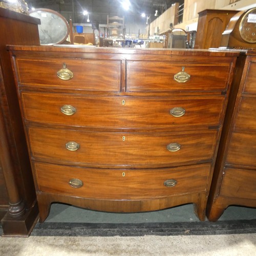 3063 - A 19th Century inlaid mahogany bow front chest of 2 short and 3 long drawers with oval brass drop ha... 