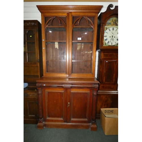 2929 - A Victorian mahogany ecclesiastical style bookcase cabinet with two glazed doors enclosing shelves, ... 