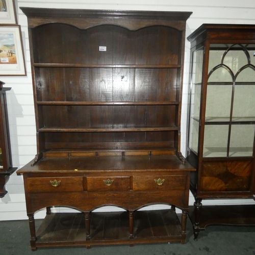 2934 - An oak dresser with 4 open shelves, three drawers and an open pot board below, approximately 143cm w... 