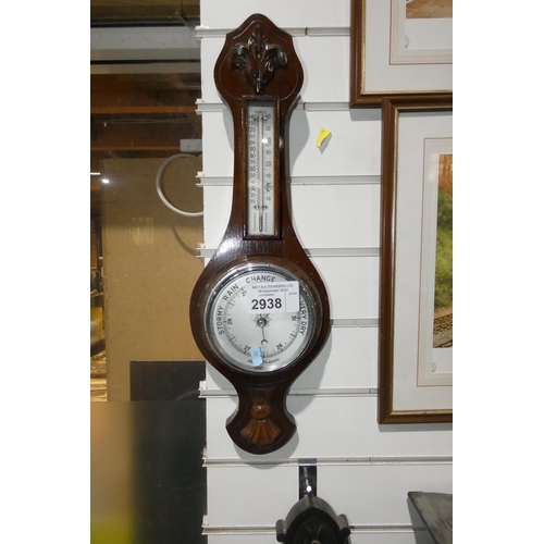 2938 - A small aneroid barometer and mercury thermometer in an oak case