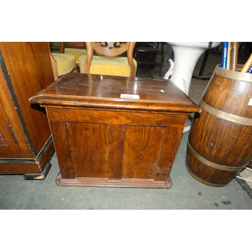 2958 - A floor standing mahogany sewing box with a lift lid and fitted interior