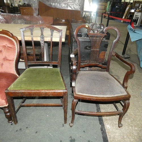 2970 - A carved mahogany elbow chair and a carved mahogany dining chair