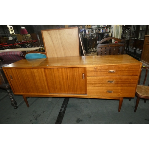 2991 - A 1970s vintage teak sideboard with two sliding doors and 3 drawers, by Austinsuite, approximately 1... 