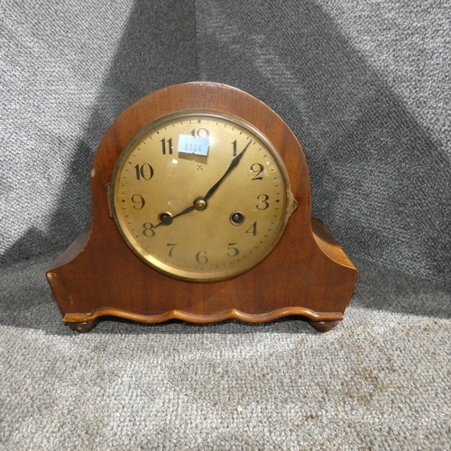 2999 - A wooden domed top mantel clock