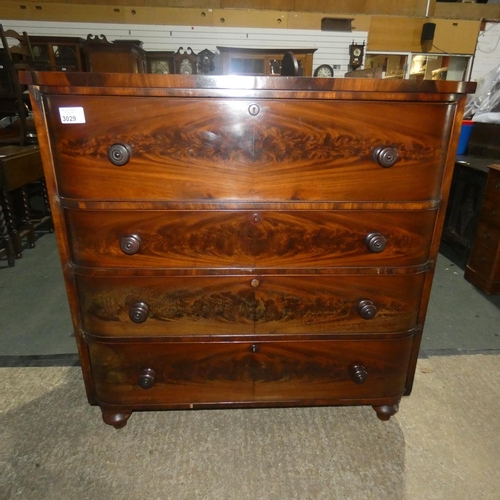 3029 - A Victorian mahogany chest of four drawers with turned knobs, approximately 121 cm wide