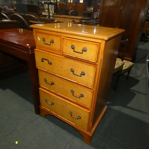 3038 - A reproduction bird's-eye maple wood bedroom chest of 2 short and 3 long drawers, approximately 56 c... 