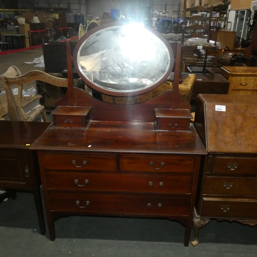 3044 - An Edwardian inlaid mahogany dressing chest with an oval swing mirror 2 short and 2 long drawers und... 