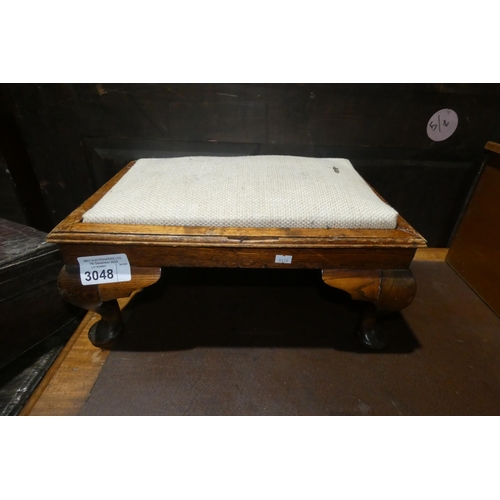 3048 - A small upholstered footstool