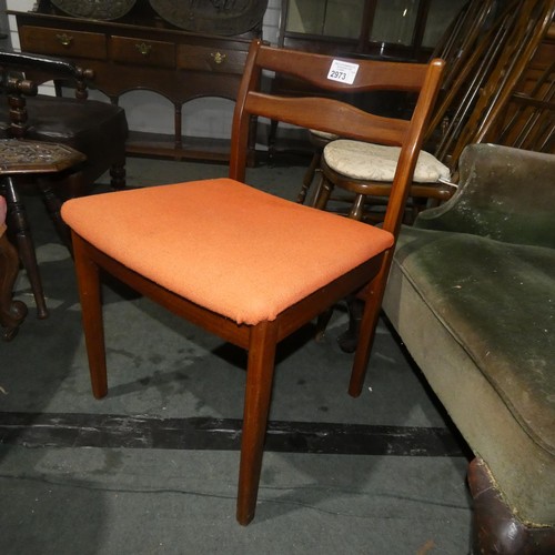 2973 - A set of four 1970s vintage teak dining chairs with orange upholstered seats