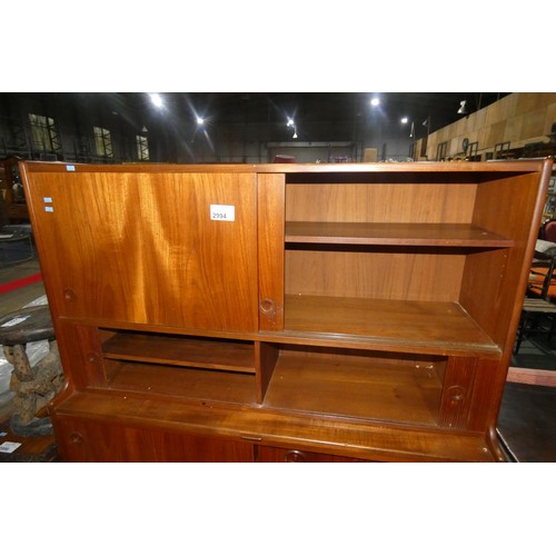 2994 - A 1970s vintage teak sideboard with two sliding doors, 2 tambour doors, sliding door and three drawe... 