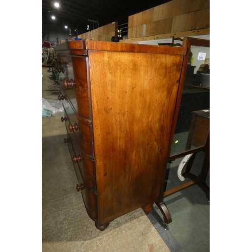 3029 - A Victorian mahogany chest of four drawers with turned knobs, approximately 121 cm wide