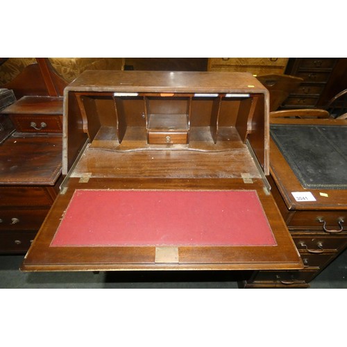 3042 - A walnut bureau with a fall front enclosing a fitted interior and 3 drawers under,  approximately 77... 