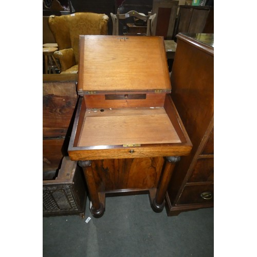 3014 - A 19th Century rosewood Davenport desk with a gallery top, a lift writing slope and side drawers, ap... 