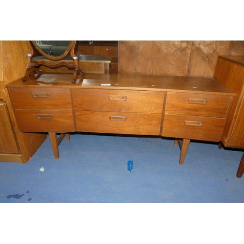 3071 - A 1970s vintage teak concave front sideboard with 6 drawers, approximately 150cm wide. No make visib... 