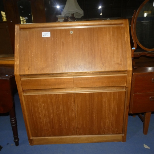 3073 - A 1970s vintage light wood bureau by Remploy with a fall front enclosing a fitted interior, 2 drawer... 