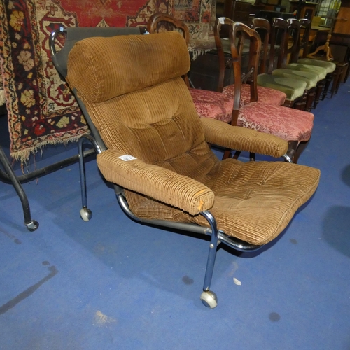 3078 - A 1960s vintage chromium tubular framed easy armchair with brown corduroy upholstery. No make visibl... 