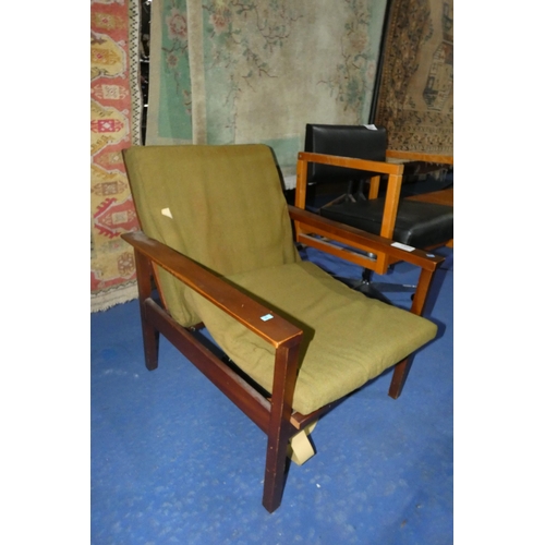 3081 - A 1970s vintage Guy Rogers armchair with green upholstery