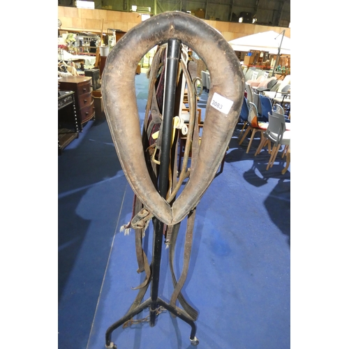 3083 - A pair of horse hames, a cart horse collar and various leather horse tack