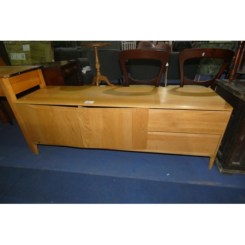 3091 - A 1990s vintage Ercol light wood sideboard with 2 doors and 2 drawers, approx 160cm wide. Please not... 