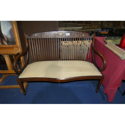 3134 - An Edwardian marquetry inlaid mahogany two-seater settle with a fawn upholstered seat