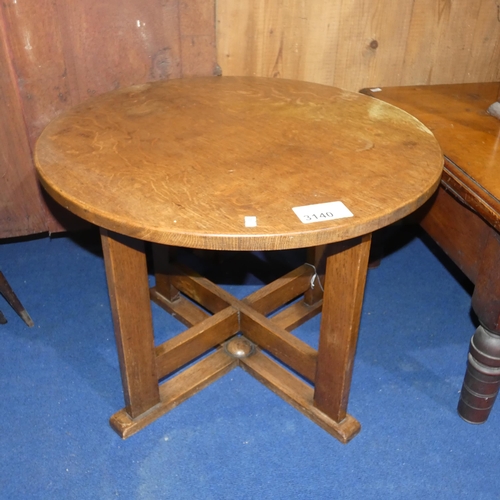 3140 - A vintage golden oak circular coffee table approx 60 cm diameter