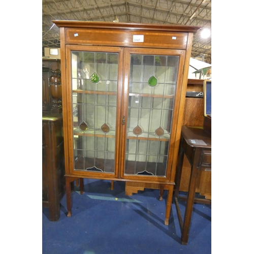 3147 - An Edwardian inlaid mahogany display cabinet with 2 leaded glazed doors enclosing lined shelves, app... 