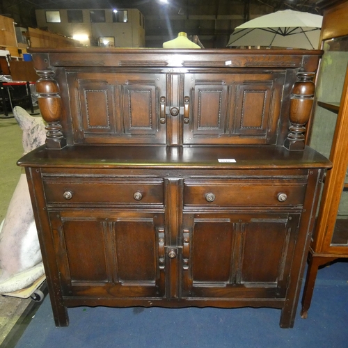 3148 - A reproduction dark oak Court cupboard approximately 122cm wide