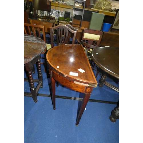 3157 - A 19th Century inlaid mahogany semicircular foldover card table enclosing a green based surface