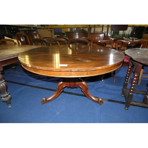 3159 - A 19th Century mahogany circular topped tip-up pedestal loo table on a tripod base