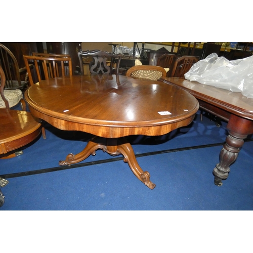 3161 - A 19th Century mahogany circular topped tip-up loo table on turned pedestal with tripod base