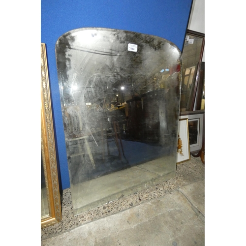 3164 - An unframed bevelled overmantle mirror approx 91 cm wide