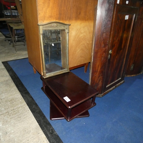 3210 - A dark wood rectangular topped swivel top table and a rectangular wall mirror