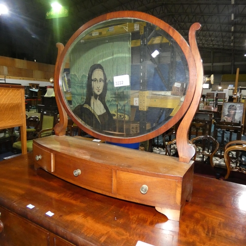 3222 - A mahogany box base dressing mirror with an oval glass and 3 bow front drawers under