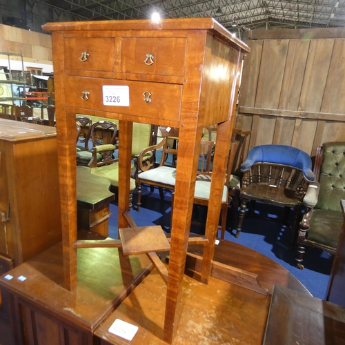 3226 - A small reproduction walnut side table with 3 small drawers and shelf under, approximately 38 cm wid... 