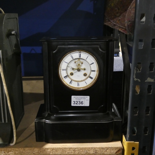 3236 - An Edwardian black slate cased mantel clock