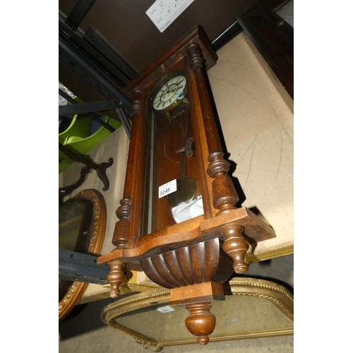 3249 - A 19th Century mahogany case Viennese regulator with a brass dial and pendulum