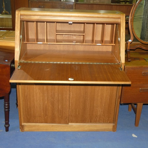 3073 - A 1970s vintage light wood bureau by Remploy with a fall front enclosing a fitted interior, 2 drawer... 