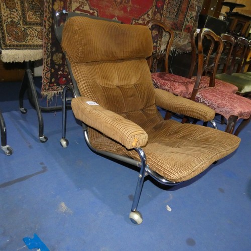 3078 - A 1960s vintage chromium tubular framed easy armchair with brown corduroy upholstery. No make visibl... 