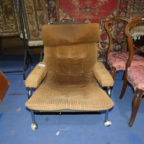 3078 - A 1960s vintage chromium tubular framed easy armchair with brown corduroy upholstery. No make visibl... 